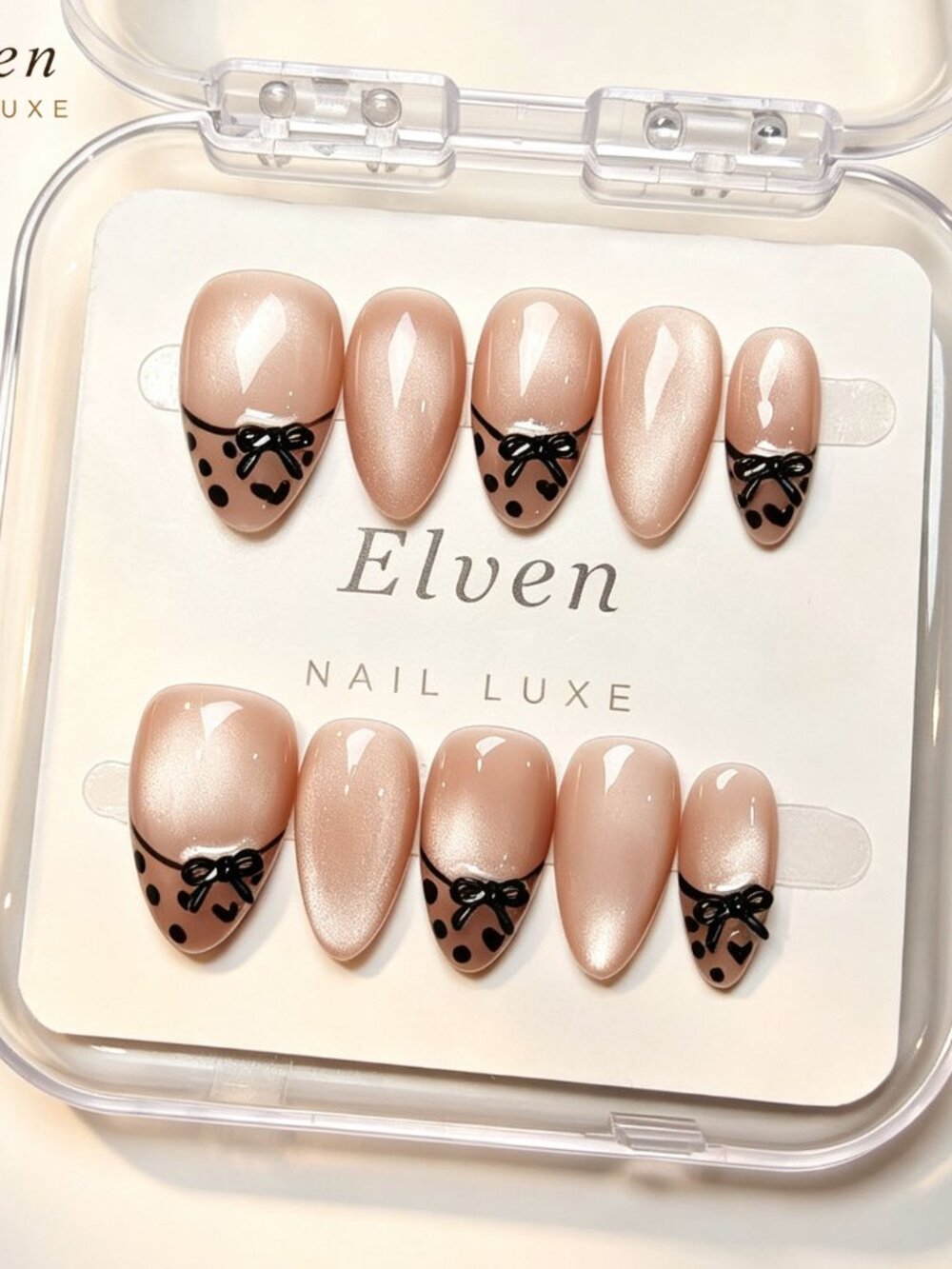 Elegant Nude Handmade Press-On Nails Short Almond with Black Bow Design